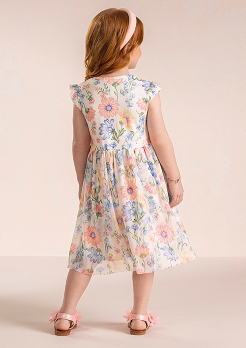 Costas do vestido infantil floral com tule de acabamento confortável e forro macio.